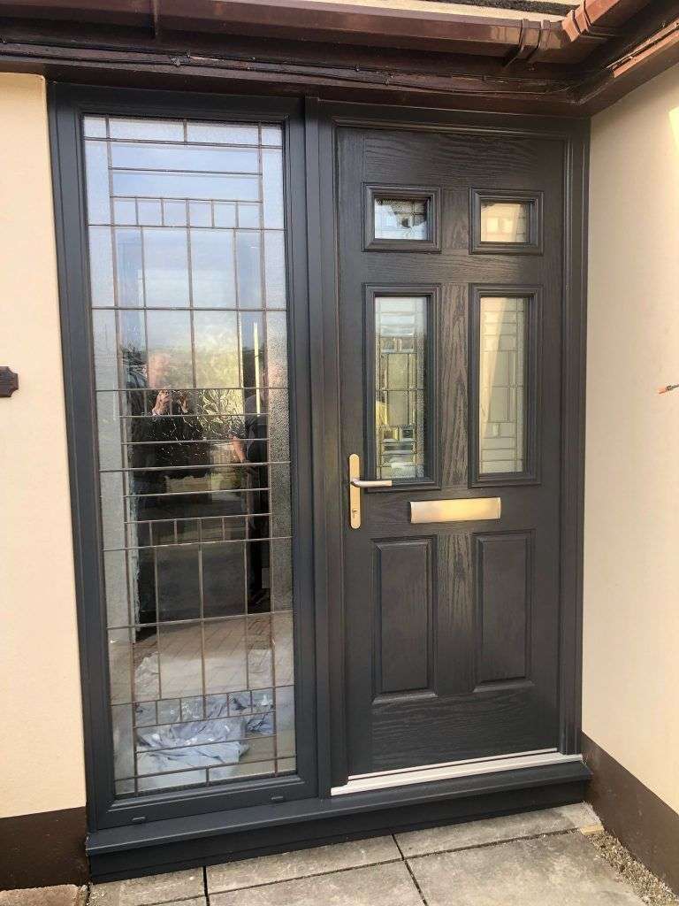 a black door with a glass window